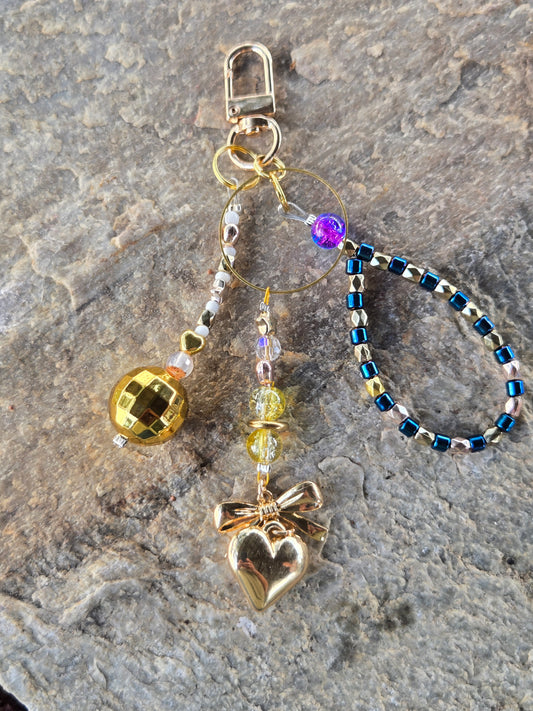 Trio with Gold Heart, Disco Ball, and Blue Beads